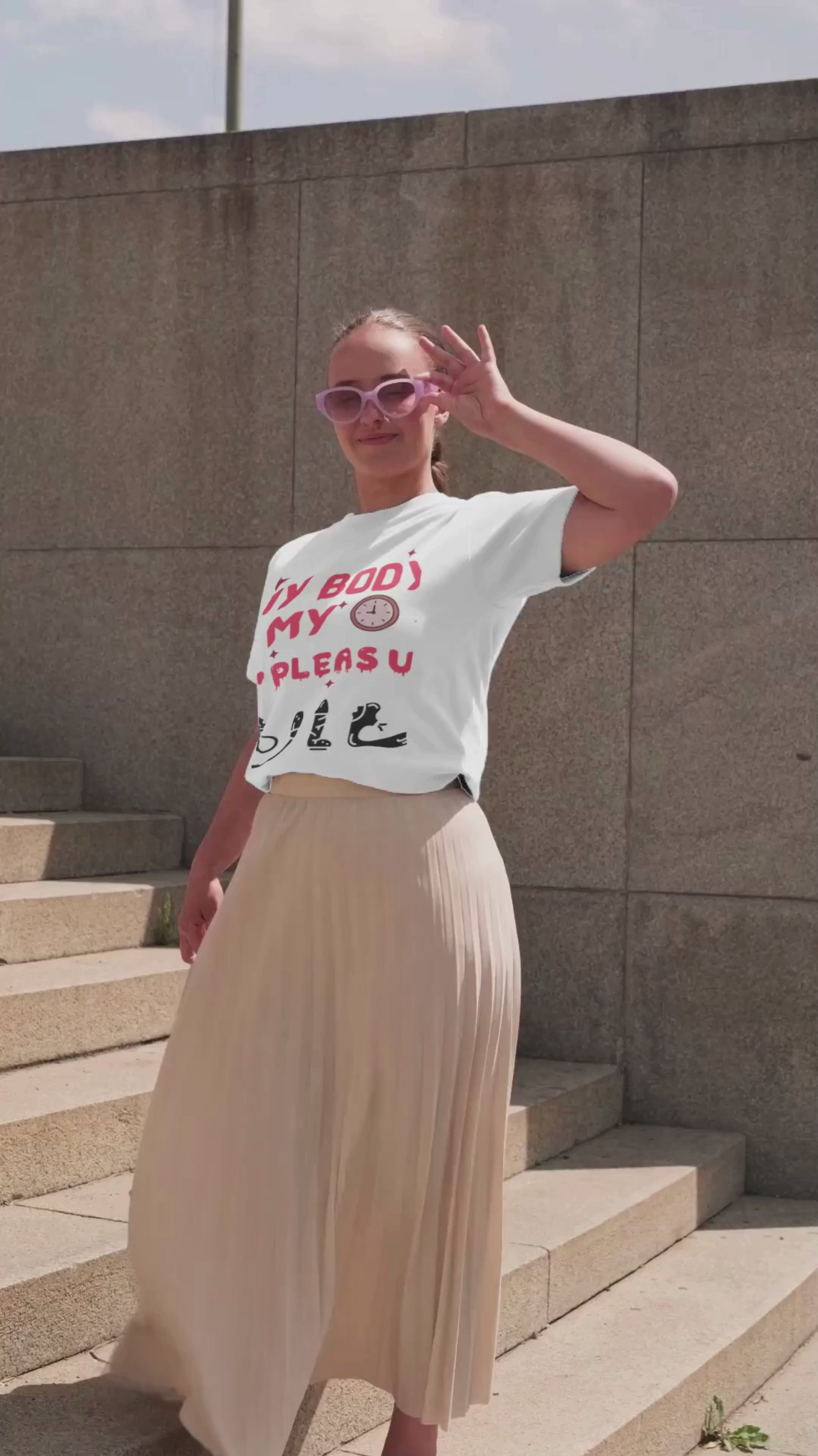 Person wearing My Body My Time My Pleasure style graphic t-shirt.